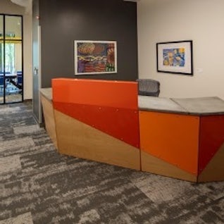 UA Little Rock Julia Napolitano WCAD conference desk