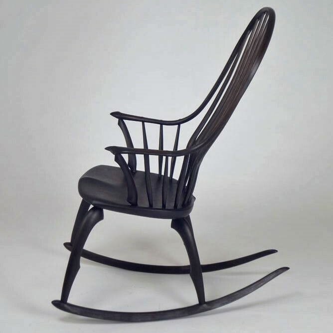 continuous arm rocker